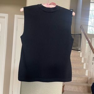 St. John sleeveless shell top with zip shoulder.